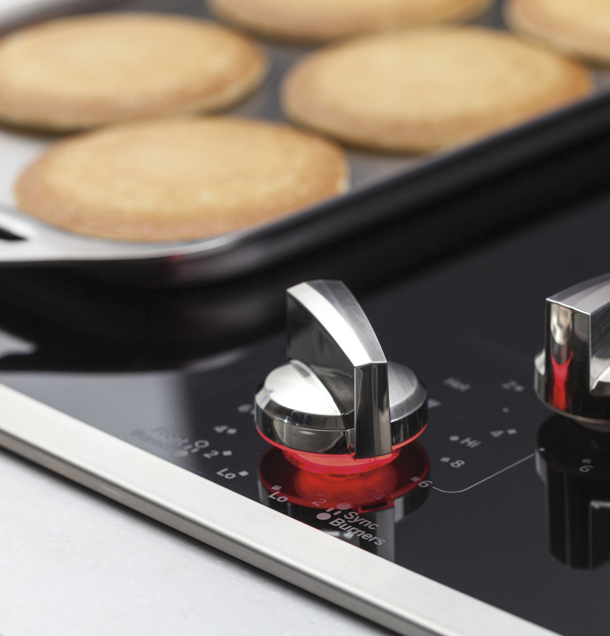 GE Profile - 36.125 Inch Electric Cooktop in Black - PP7036SJSS