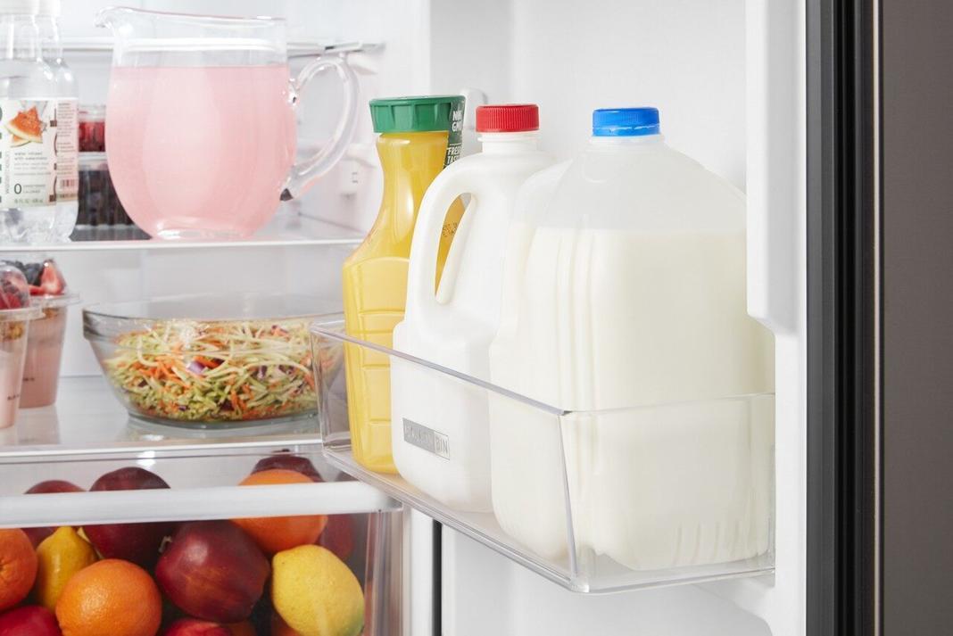 Whirlpool - 24.375 Inch 11.6 cu. ft Top Mount Refrigerator in Stainless - WRT312CZJV