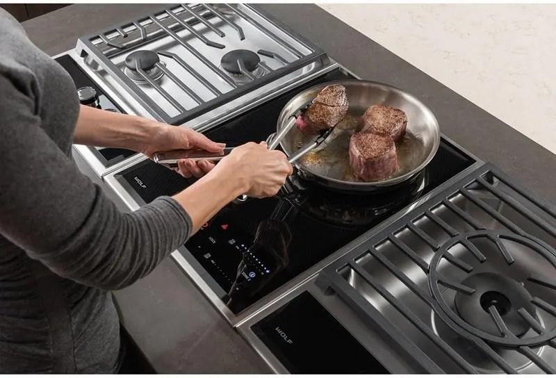 Wolf - 15 inch wide Electric Cooktop in Black - CE152TF/S/208