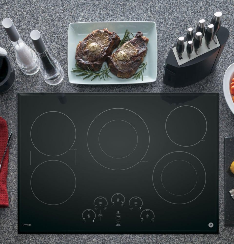 GE Profile - 29.75 inch wide Electric Cooktop in Black - PP9030DJBB